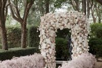07 a fantastic lush white and blush wedding arch, an aisle covered with mirrors and lined up with blush baby’s breath is a gorgeous idea for spring