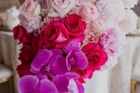 22 a jaw-dropping wedding bouquet from white to light pink, fuchsia and bold purple and a cascading effect is a bright idea