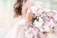 24 a super romantic and chic pink one flower wedding bouquet is a gorgeous solution for a spring bride