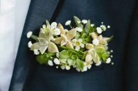 33 a grey blazer with black rim lapels and a fresh boutonniere done with white and green blooms and succulents for a fresh look