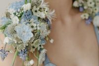 36 a delicate pastel blue and white cape plus some greenery is a lovely idea for a spring bride