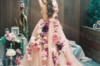 40 a jaw-dropping blush strapless wedding dress beautifully detailed with pink, blush and purple blooms for a wow effect