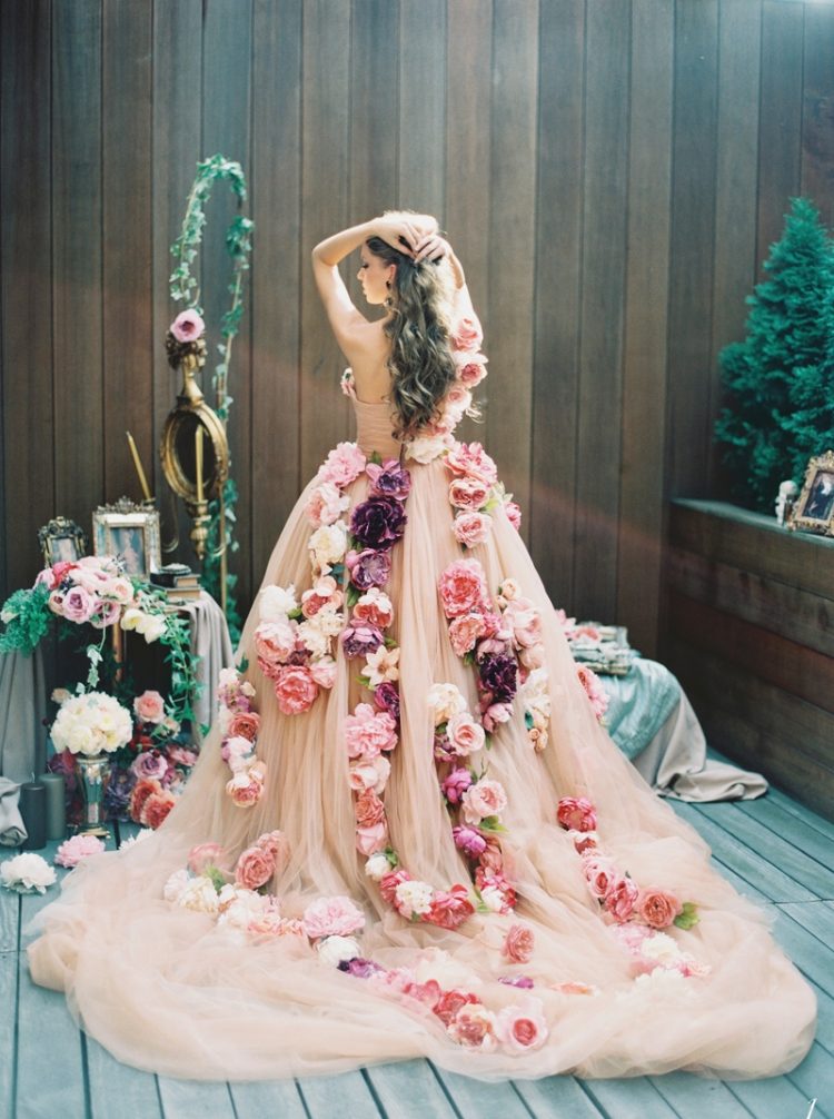 a jaw-dropping blush strapless wedding dress beautifully detailed with pink, blush and purple blooms for a wow effect