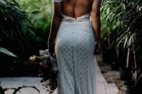 a chic boho lace sheath wedding gown with short sleeves, a cutout back looks very sexy