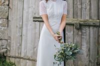a chic yet modest wedding dress with a boho lace bodice, a turtleneck, short sleeves and a plain skirt