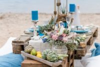 a cool beach wedding tablescape in boho style