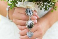 a couple of photos and a heart with a quote as a pendant for a wedding bouquet is a great way to honor those who you loved