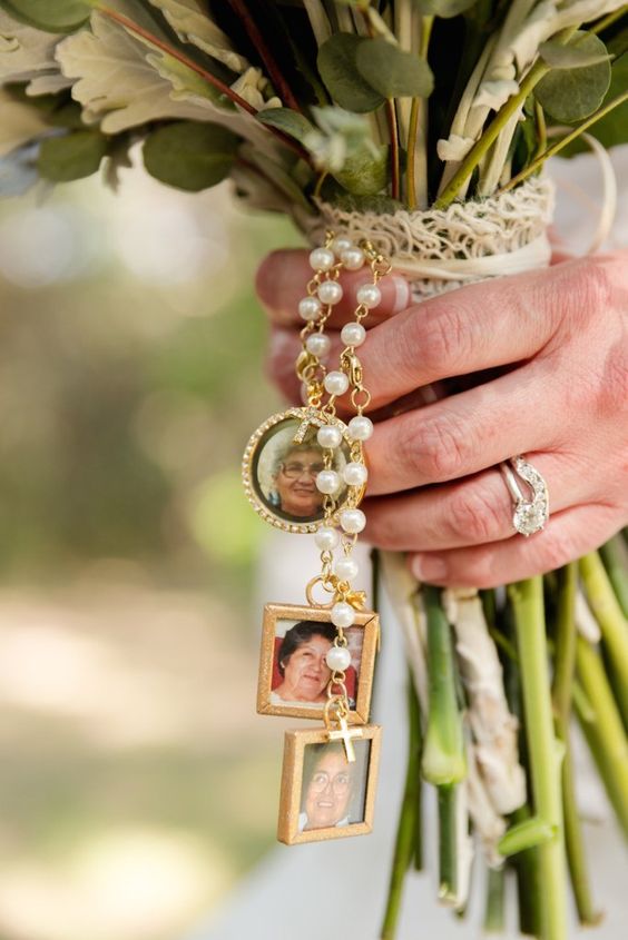 a crochet wedding bouquet wrap with a pearl rosary and photos of the people who passed away but loved a lot