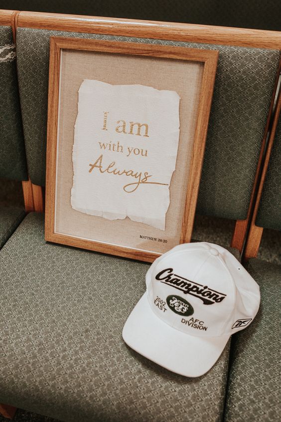 a framed sign and a favorite thing of a person who passed away can be placed on the chair that this person could take