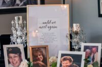 a memorial table with framed photos, candles and a sign is a cool idea for a wedding, honor everyone who is gone
