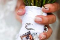 a photo of the loved dog attached to the wedding bouquet wrap with a pin is a lovely way to honor the pet