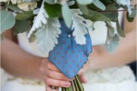 a wedding bouquet wrap of a tie of the person who is missing but still loved a lot