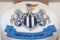 forget the World Cup—this groom’s cake, complete with Newcastle United’s crest, takes the win