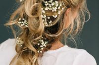 romantic tousled bridal braid adorned with baby’s breath will be a nice option for a spring or summer bride