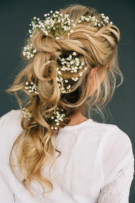 romantic tousled bridal braid adorned with baby's breath will be a nice option for a spring or summer bride