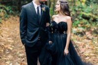 a black strapless wedding ballgown with an embellished sash and a train for a fall woodland wedding