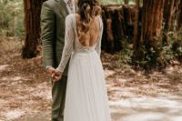an A-line wedding gown with a boho lace bodice, long sleeves, a cutout back and a flowy light skirt