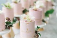 blush buttercream individual wedding cakes with blooms and berries for a romantic pink wedding