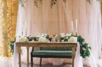 blush sheer curtains with greenery on top is a stylish and simple backdrop, add a matching table runner