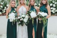dark green bridesmaid maxi dresses with slits and halter necklines and a romantic white lace wedding dress