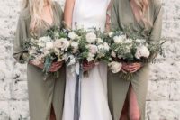 matching long sleeve sage green wrap bridesmaid dresses and a plain modern wedding dress for the bride