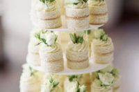naked vanilla individual wedding cakes with cream and white roses for a beautiful neutral wedding