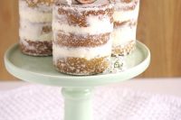 naked vegan individual wedding cakes topped with baby’s breath and figs are delicious desserts