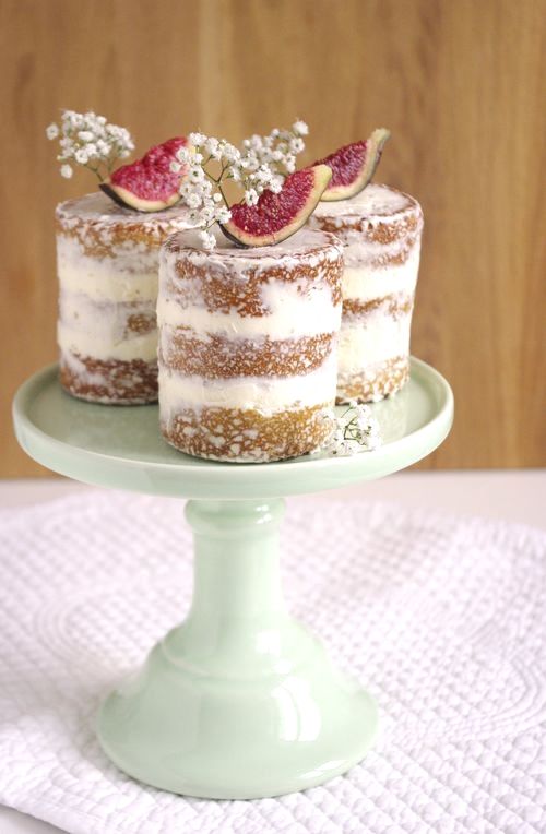 naked vegan individual wedding cakes topped with baby's breath and figs are delicious desserts