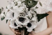 white blooms, greenery and neutral ribbons make this bouquet super cool and chic