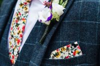 a bold groom’s look with a navy plaid three-piece suit, a bold floral tie and a handkerchief, a pretty floral boutonniere is amazing for fall
