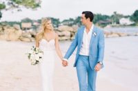 a bright blue groom’s suit, tan moccasins and a white shirt for a bold and statement beach wedding look