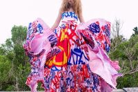 a colorful graffiti strapless wedding dress with layers of ruffle skirt is a unique and bold idea to rock