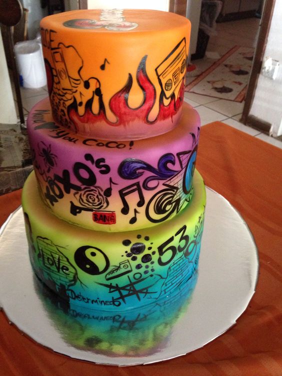 a colorful graffiti wedding cake with bold colors and prints is a lovely idea for a bold modern wedding