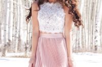 a romantic look with a sleeveless white crop top, a pink pleated maxi skirt and a pink clutch