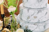 a textural bark-imitating wedding cake for a woodland or camp wedding is a cool solution