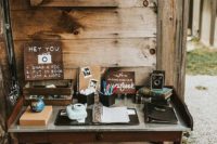 a wedding guest book station in rustic style will fit a rustic, a woodland or a mountain wedding