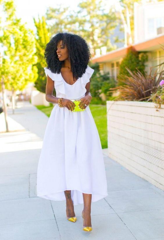 a white plain high low midi dress with a ruffle top, gold shoes and a neon yellow mini bag