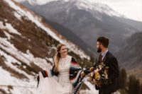 comfy brown boots and a striped folksy coverup for a boho mountain elopement