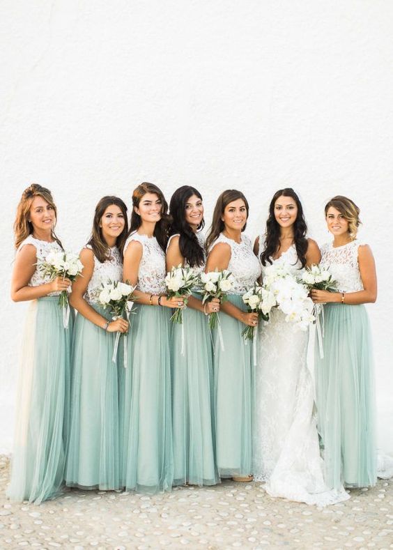 elegant sleeveless white lace tops and seafoam green maxi skirts for an ocean or beach wedding