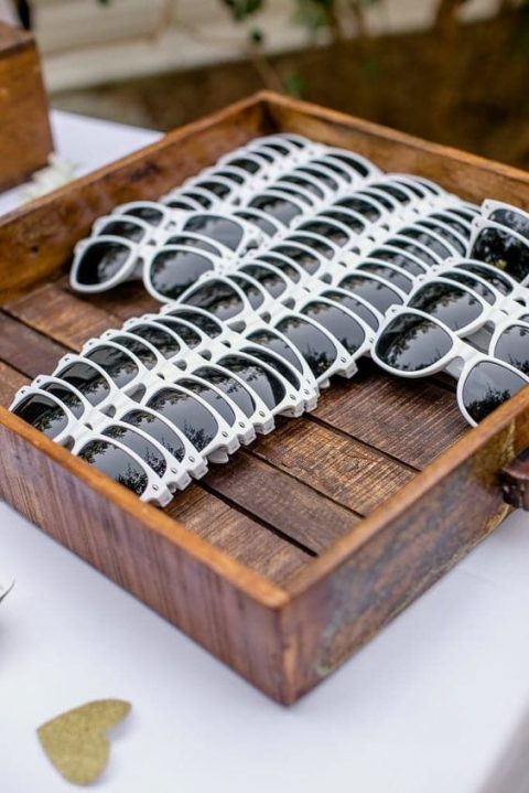 give your guests sunglasses as the sun may be more intense up, these will be cheap and cool gifts