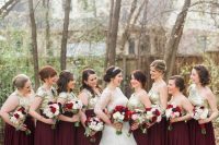 glam bridesmaid outfits with mismatching gold sequin tops and burgundy pleated maxi skirts plus bold bouquets are wow