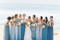 mismatching blue bridesmaid dresses with various designs and looks are nice for a blue beach wedding