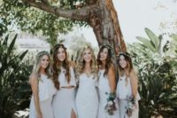 neutral summer bridesmaid looks with spaghetti strap crop tops and white skirts with slits