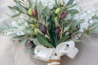 olive branches with green and black olives, white blooms, a ribbon bow and some twine to wrap up the bouquet