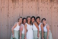 relaxed bridesmaid looks with white plain tank tops and seafoam green tulel maxi skirts are gorgeous for a beach wedding