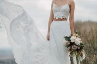 a beautiful and romantic bridal look with a spaghetti strap lace crop top and an A-line lace skirt with a train is an amazing idea