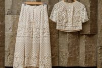 a boho lace bridal separate with a crop top, a high low midi skirt is a lovely idea for Iceland, hang it over the fireplace, on a stone wall