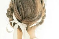 a lovely hair updo for a wedding with a bow
