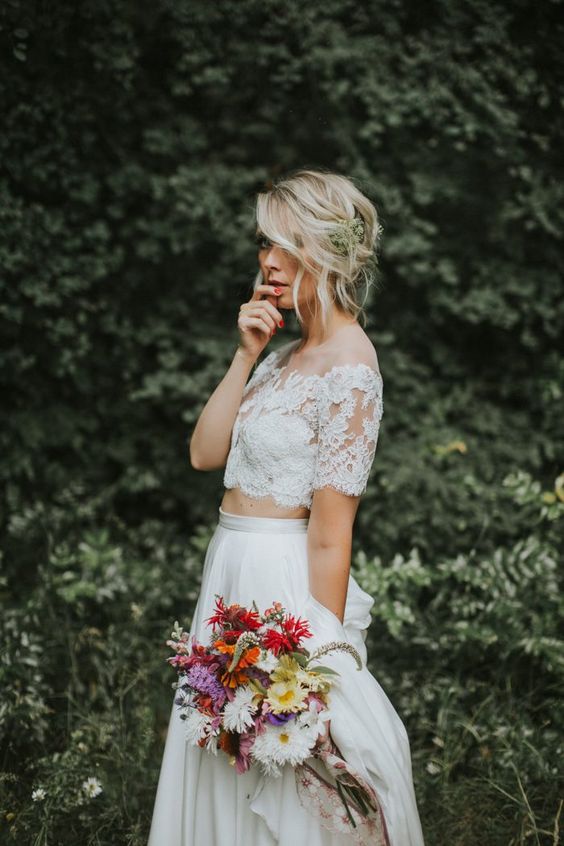 a cute bridal look with alace off the shoulder crop top, a pleated high waisted skirt is lovely for a boho wedding