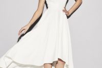 a dreamy off the shoulder plain high low wedding dress with a pleated skirt, white ankle strap shoes for a modern and romantic look